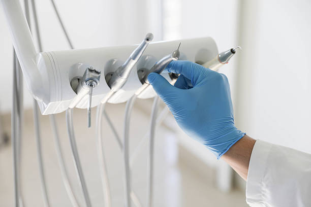 Professional Root Canal Treatment technician working in Chesaning, MI